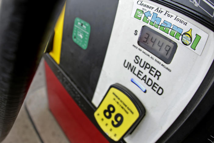 A motorist fills up with gasoline containing ethanol in Des Moines, Iowa. President Biden announced Tuesday that he will lift the summer restriction on gasoline containing the E15 ethanol blend.