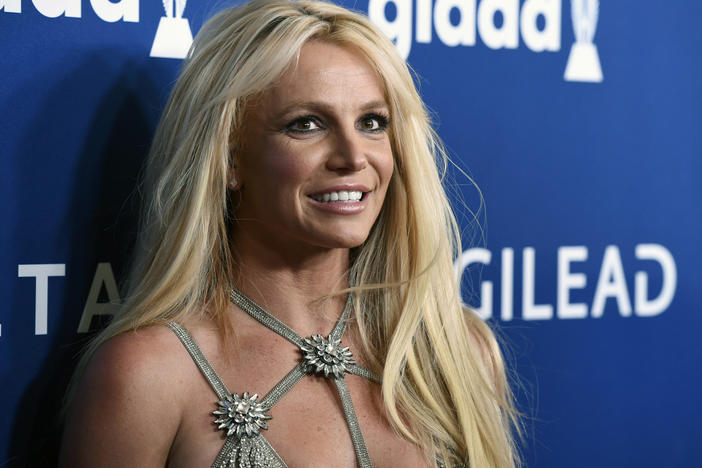 Britney Spears, seen in 2018, recently succeeded in ending a 13-year conservatorship that had limited decisions about her own life, including getting pregnant.