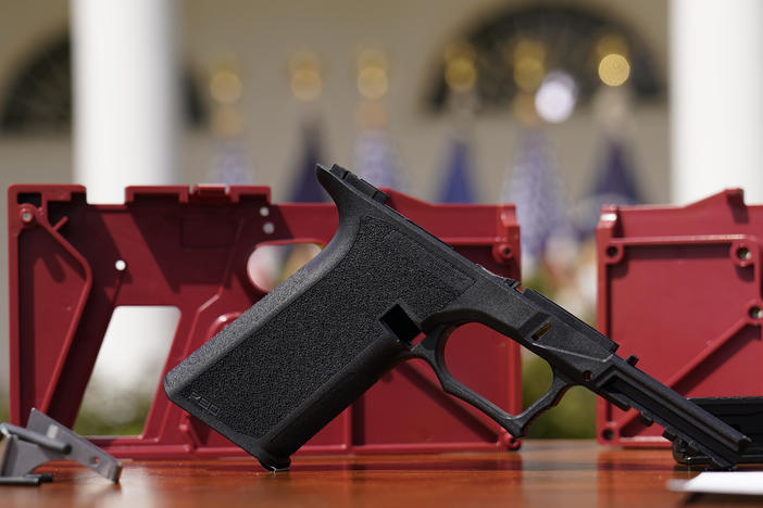 A 9mm pistol build kit with a commercial slide and barrel with a polymer frame is displayed at the White House.