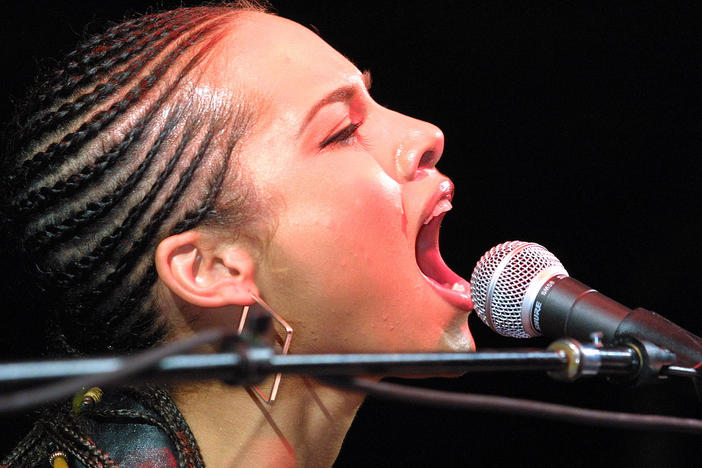 Singer Alicia Keys performing at Madison Square Garden in New York City, a few months after the 9/11 attacks in 2001.