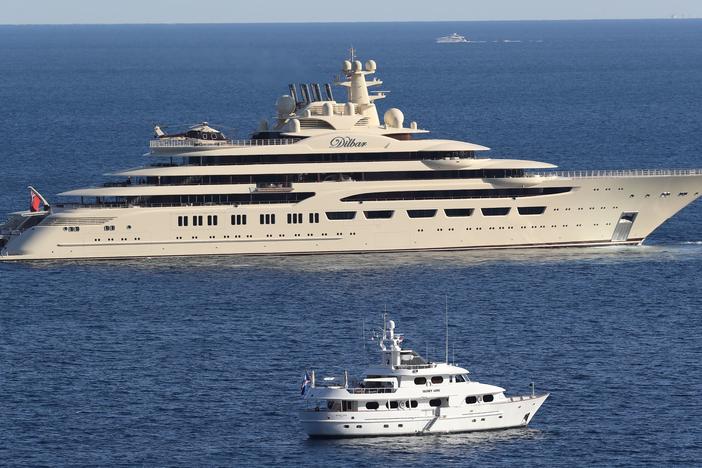 The luxury superyacht Dilbar sails off the coast of Monaco in 2017.