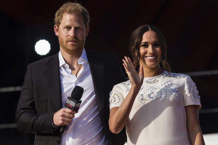 Prince Harry and his wife Meghan speak during the Global Citizen festival, on Sept. 25, 2021, in New York. The couple visited Queen Elizabeth II at Windsor Castle on Thursday.