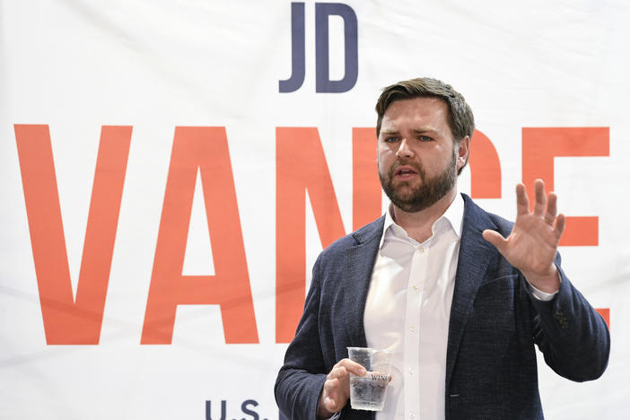 Republican U.S. Senate candidate J.D. Vance speaks with prospective voters on Monday in Troy, Ohio.