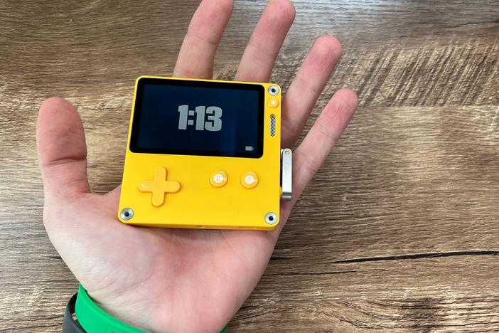 Bright and cheerful, the Playdate fits in the palm of your hand.