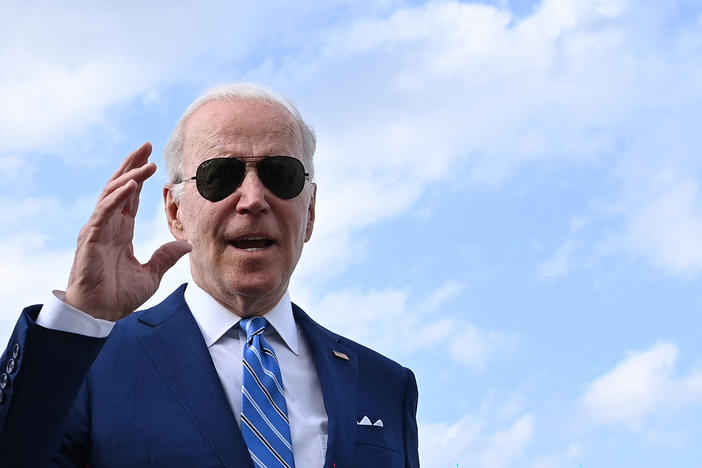 President Biden speaks to reporters prior to boarding Air Force One at Des Moines International Airport in Des Moines, Iowa, on April 12.