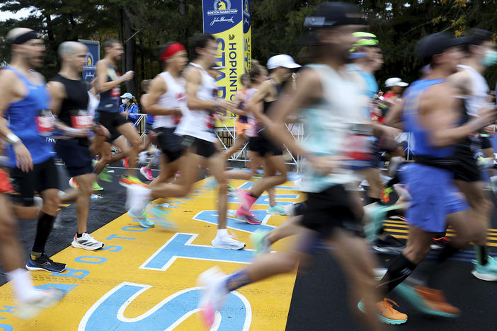 Runners cross the starting line of the 125th Boston Marathon last fall in Hopkinton, Mass. The Boston Marathon returns on Monday.
