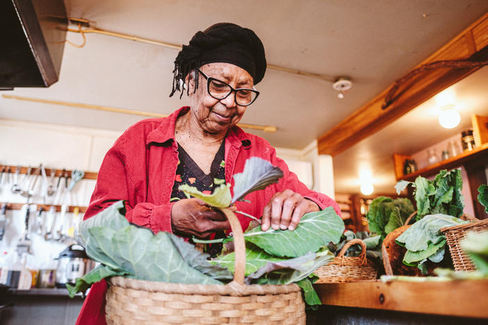 Ira Wallace talks about collard greens at Acorn Community Farm in Mineral, Va. "Purple is a color that develops in the winter much more strongly," Wallace says.