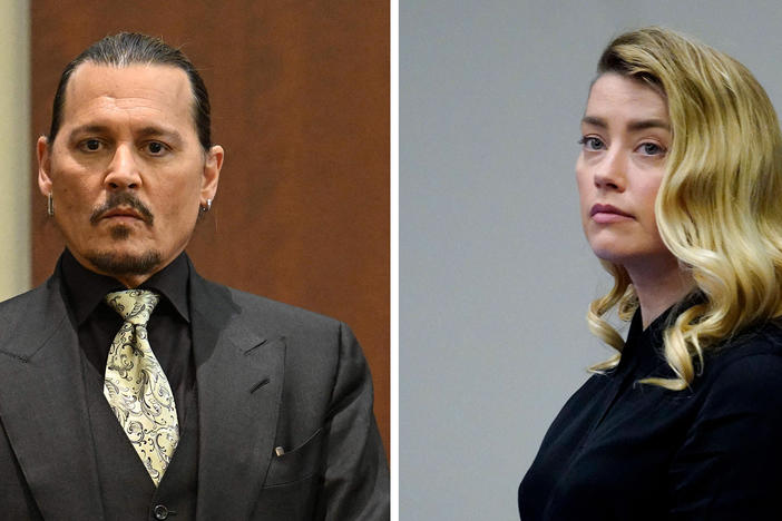 Johnny Depp testifies during his defamation trial in the Fairfax County Circuit Courthouse in Fairfax, Va., on Tuesday. Amber Heard watches the jury leave as a lunch break starts at the Fairfax County Circuit Court on Monday.