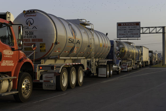 Commercial trucks wait to cross the Pharr-Reynosa International Bridge in Pharr, Texas, last week, before Gov. Greg Abbott lifted his order requiring additional inspections of trucks arriving from Mexico.