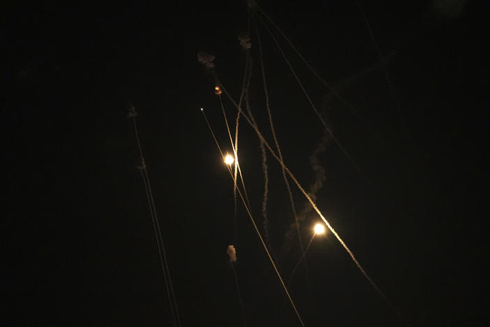 Israel's Iron Dome air defense system launches missiles to intercept rockets fired from the Gaza Strip toward Israel, over Gaza City, early Thursday, April 21, 2022.