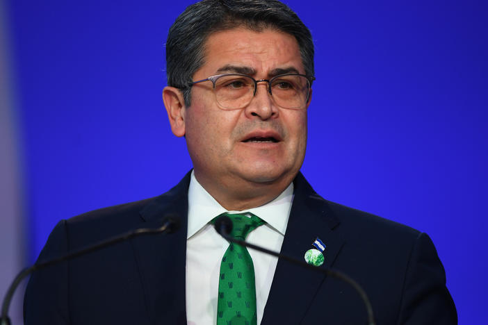 On Nov. 1, 2021, Honduran President Juan Orlando Hernández delivers his national statement during day two of the U.N. Climate Change Conference in Glasgow, Scotland.