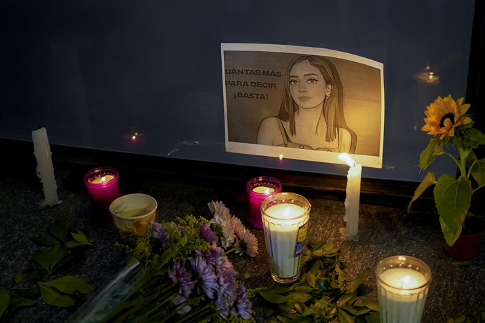 Candles and flowers surround an image of Debanhi Escobar during a protest over her disappearance and other similar cases at the Attorney General's office in Mexico City on Friday.