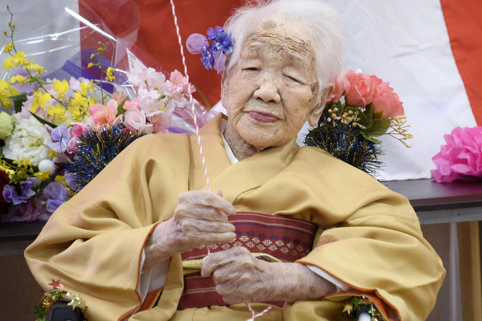 Kane Tanaka, born in 1903, smiles as a nursing home celebrates three days after her 117th birthday in Fukuoka, Japan, on Jan. 5, 2020.