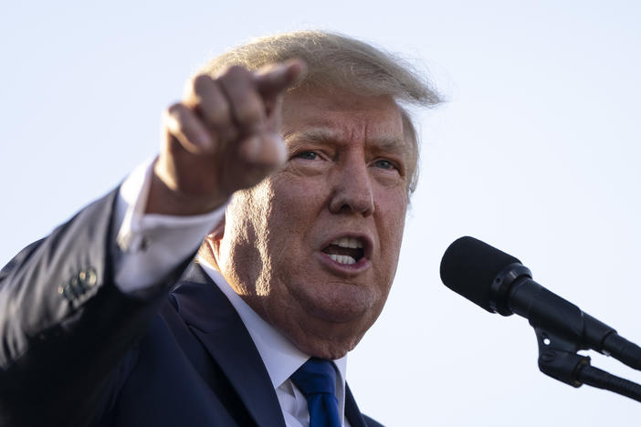 A judge holds Donald Trump in contempt of court and fines him $10 000