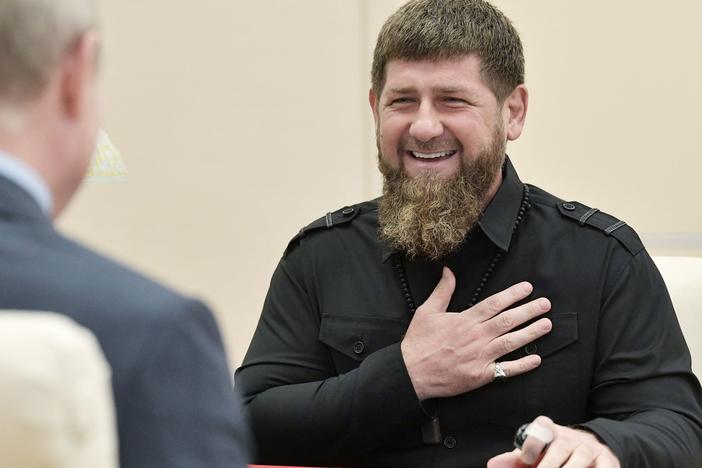 The head of the Chechen Republic, Ramzan Kadyrov, speaks with Russian President Vladimir Putinin 2019.