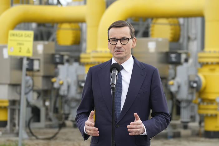 Poland's Prime Minister Mateusz Morawiecki speaks to media at the gas station of Gaz-System in Rembelszczyzna, near Warsaw, Poland, on Wednesday. Polish and Bulgarian leaders accused Moscow of using natural gas to blackmail their countries after Russia's state-controlled energy company stopped supplying the two European nations Wednesday.