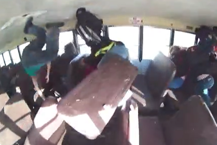 A video aboard the school bus captures the moment a car crashes into the bus during the February incident.