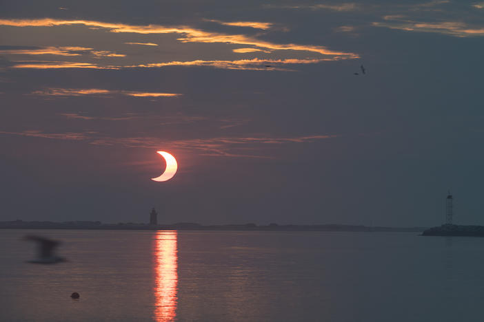 In 2021, a partial solar eclipse is visible in Lewes, Del. This Saturday, people in the Southern Hemisphere will get a chance to glimpse the phenomenon.