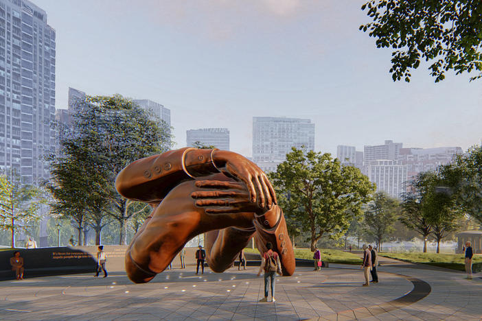 An artist's rendering of "The Embrace," a memorial to the Rev. Martin Luther King Jr. that will be unveiled in Boston in 2023.