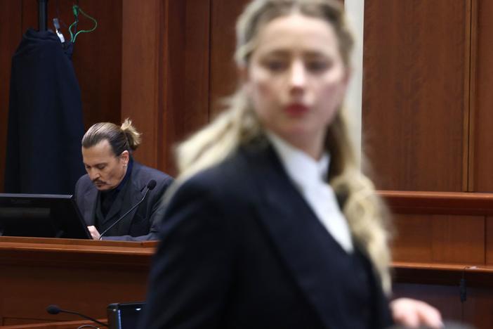 Amber Heard has filed a countersuit against Johnny Depp, seeking $100 million in damages and saying his legal team falsely accused her of fabricating claims against Depp. The former couple are seen here in court last week.