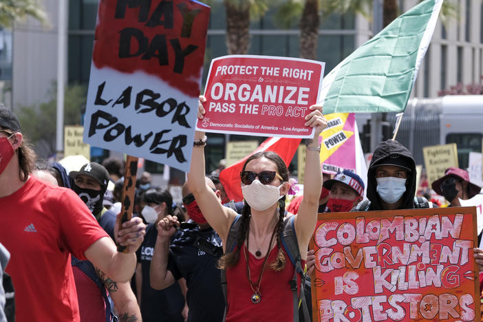 May Day demonstrators march through downtown Los Angeles last year. Thousands of people took to the streets across the nation that May 1 in rallies calling for immigration reform, workers' rights and police accountability.