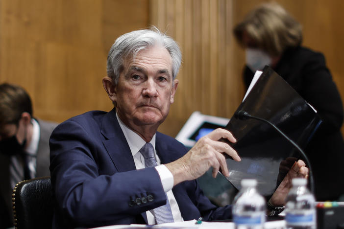 Federal Reserve Chair Jerome Powell collects his notebooks as he testifies before the Senate Banking Committee on March 3. The Fed is widely expected to raise interest rates by half a percentage point at its meeting this week.