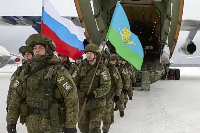 Russian troops arrive back in the Russian city of Ivanovo on Jan. 15 after serving briefly in the former Soviet republic of Kazakhstan. The Russian forces were dispatched to help Kazakhstan's President Kassym-Jomart Tokayev stamp out widespread protests against his authoritarian rule. Kazakhstan is just one of five former Soviet republic where Russian troops have been operating this year.