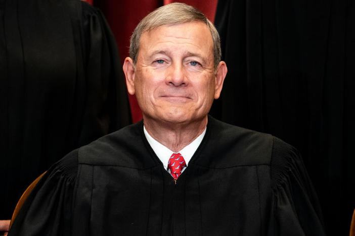 Chief Justice John Roberts sits during a group photo of the Justices at the Supreme Court in 2021.