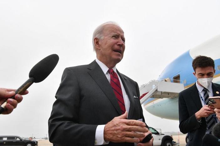 President Biden speaks to members of the press Tuesday prior to boarding Air Force One at Joint Base Andrews in Maryland.