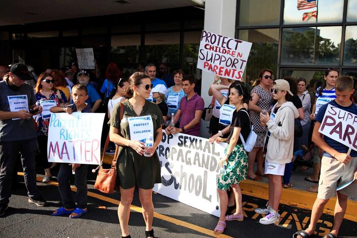 Supporters of Florida's recently signed Parental Rights in Education law demonstrate at the Duval County Public Schools building in Jacksonville, Fla., on May 3.