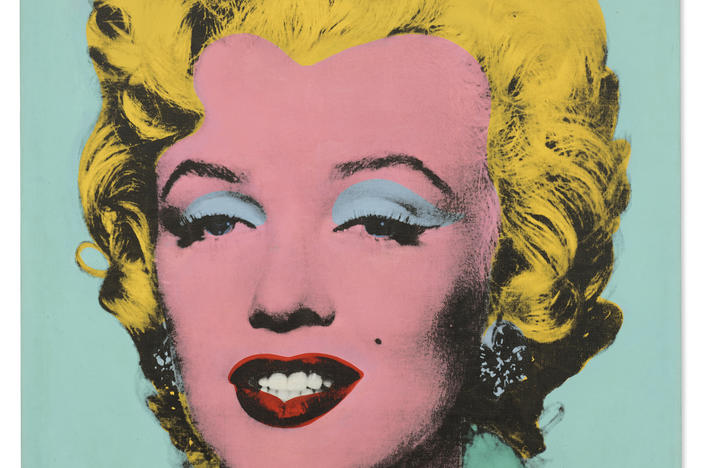Andy Warhol's <em>Shot Sage Blue Marilyn</em> has set a record as the highest-priced American work of art to be sold at auction.