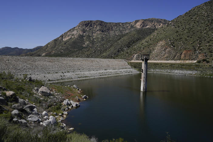 Constructed four generations ago, the massive dam at El Capitan Reservoir in Lakeside, Calif., is capable of storing over 36 billion gallons of water — enough to supply every resident in San Diego for most of a year. Today, it's three-quarters empty — intentionally kept low because of concerns it could fail under the strain of too much water.