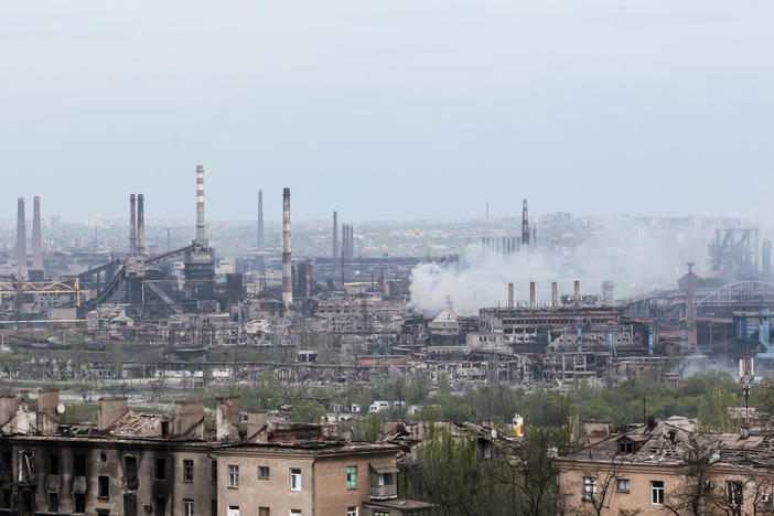 Smoke rises from the Metallurgical Combine Azovstal in Mariupol, eastern Ukraine, on Thursday. Heavy fighting is raging at the besieged steel plant as Russian forces attempt to finish off the city's last-ditch defenders and complete the capture of the strategically vital port.