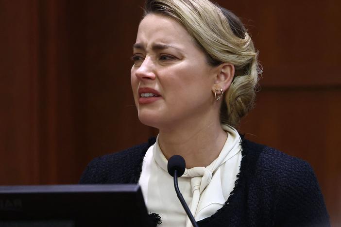 Amber Heard told a jury at the Fairfax County Circuit Courthouse in Fairfax, Va., that her ex-husband, Johnny Depp, slapped her and insulted her in front of others aboard a private flight in 2014.