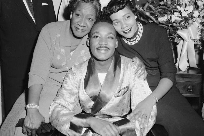 Alberta Williams King (left) with her son, Dr. Martin Luther King Jr. and daughter-in-law, Coretta Scott King on September 30, 1958.