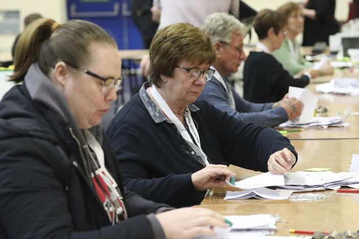 Ballot papers are counted at Peterborough Arena, for the local government elections, in Peterborough, England, Thursday, May 5, 2022.
