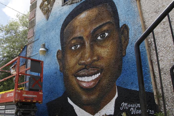 A mural of Ahmaud Arbery is on display in Brunswick, Ga., where he was shot and killed in 2020.