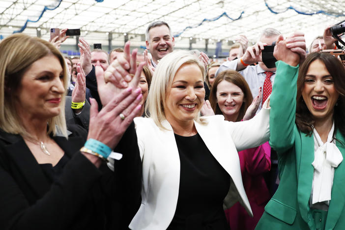 Sinn Fein's Vice President Michelle O'Neill (center) celebrates with party colleagues after being elected in Mid Ulster at the Medow Bank election count center in Magherafelt, Northern Ireland, on Friday.