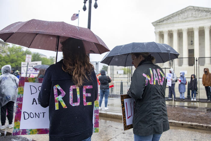 Abortion rights protesters hold a demonstration outside of the  Supreme Court on Saturday in Washington.