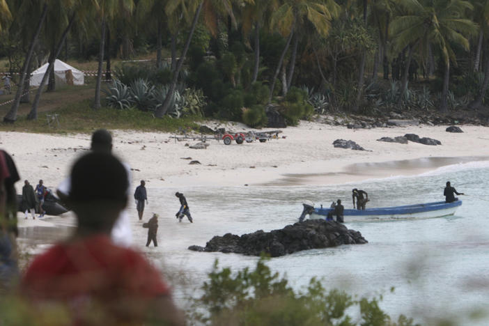 Rescuers gather at Galawa Beach, about 22 miles from Moroni, Comoros, July 1, 2009, as they prepare to search the area after a Yemenia Airbus passenger plane crashed into the Indian Ocean off the island nation of Comoros as it attempted to land in the dark amid howling winds.