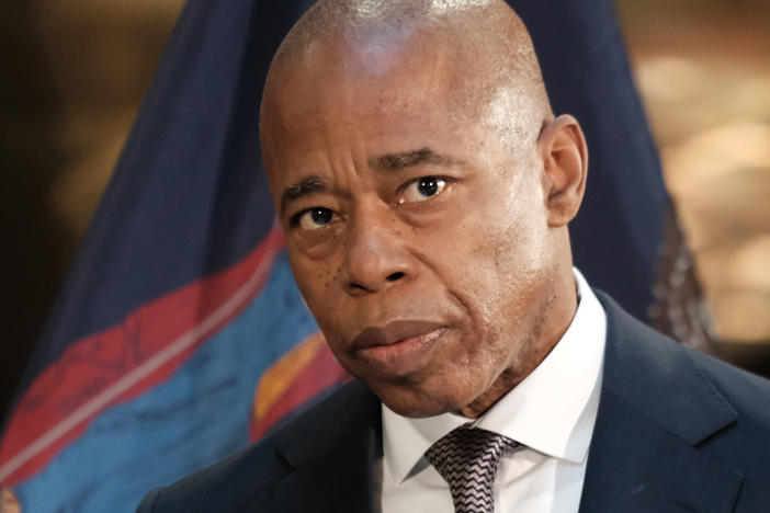 New York City Mayor Eric Adams speaks during a January news conference at a Manhattan subway station. There, he and Gov. Kathy Hochul announced new state initiatives to get homeless people out of subways and trains and into shelters.