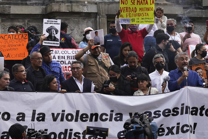Journalists protest to draw attention to the latest wave of journalist killings, at the Angel of Independence monument in Mexico City, May 9, 2022.