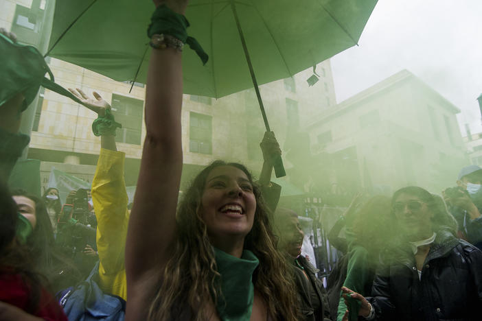 Demonstrators who support abortion rights celebrate outside the Constitutional Court in Bogota, Colombia on February 21. After an 8-hour debate, the court decriminalized abortions during the first 24 weeks of pregnancy.