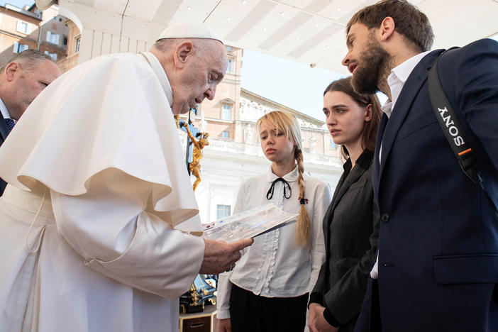 Wives of Ukrainian soldiers holed up inside the Azovstal steel plant in Mariupol meet with Pope Francis during the weekly general audience at the Vatican, Wednesday.