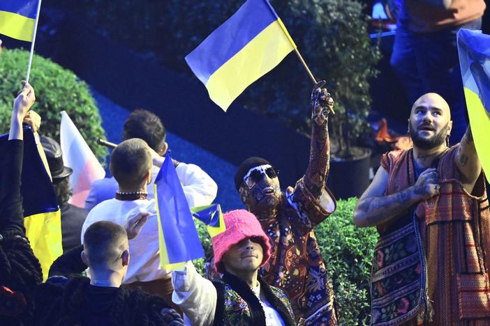 Members of Ukraine's band "Kalush Orchestra" celebrate their qualification during the first semifinal of the Eurovision Song contest 2022 on Tuesday at the Palalpitour venue in Turin. The second semifinal is on Thursday, with the grand final set for Saturday.