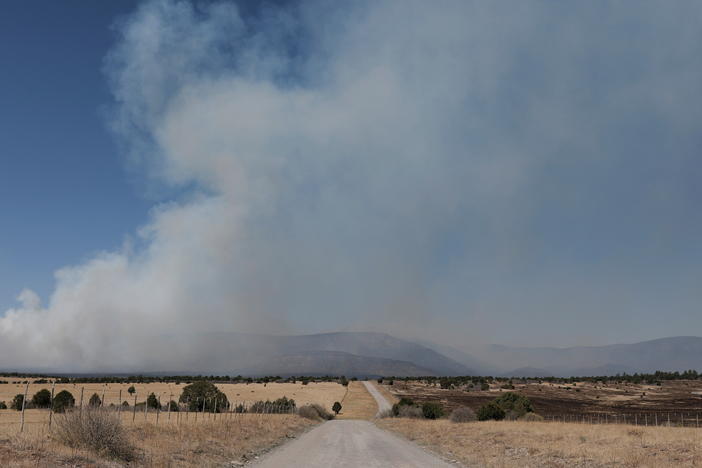Smoke billows from the Hermits Peak and Calf Canyon fire, outside of Las Vegas, New Mexico, on May 11.