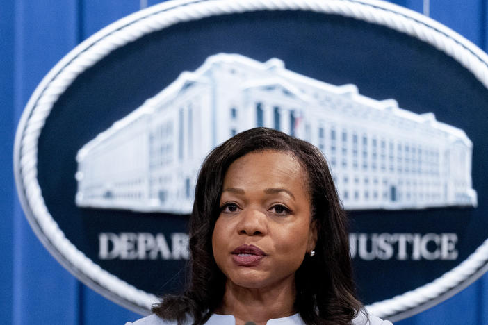 Assistant Attorney General for Civil Rights Kristen Clarke speaks at a news conference on Aug. 5, 2021. The federal government said Thursday that artificial intelligence technology to screen new job candidates or monitor their productivity can unfairly discriminate against people with disabilities.