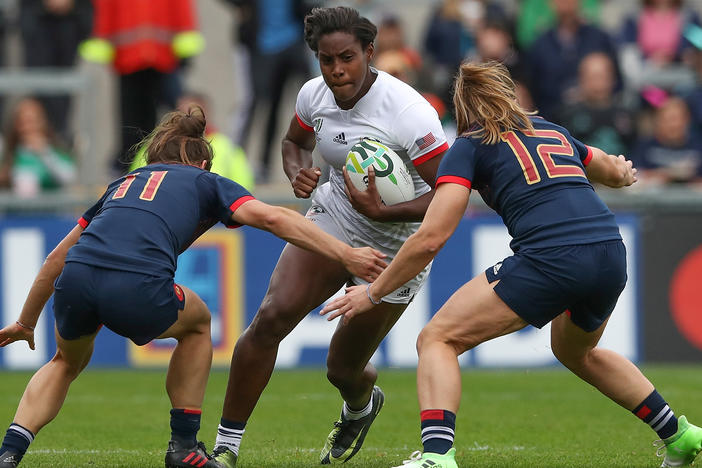 Naya Tapper of the USA is tackled by Camille Grassineau (left) and Elodie Poublan of France during the 2017 Women's Rugby World Cup third-place match in Belfast. The U.S. will host the women's tournament for the first time in 2033.