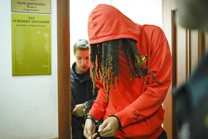 WNBA star and two-time Olympic gold medalist Brittney Griner leaves a courtroom in Khimki just outside Moscow, on Friday.