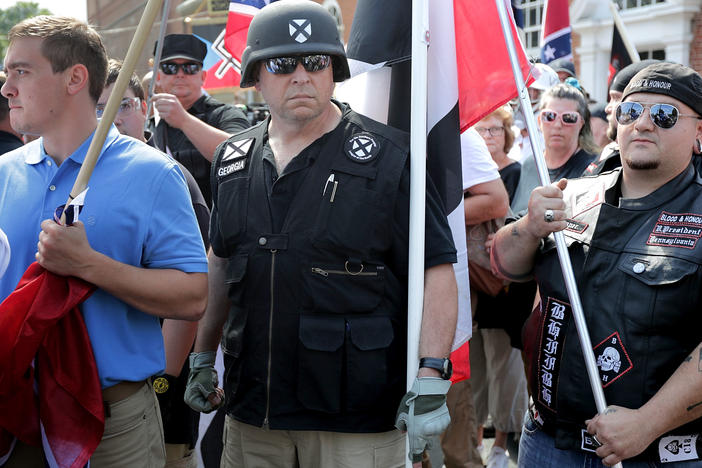 Hundreds of white nationalists, neo-Nazis and members of the "alt-right" march down East Market Street toward Emancipation Park during the "Unite the Right" rally August 12, 2017 in Charlottesville, Virginia.